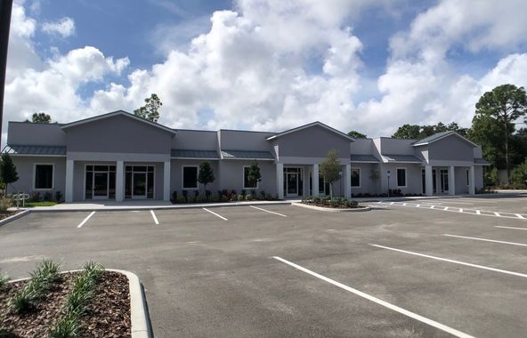 Elite Plaza | Office Condos For Sale or Lease: 3821 Woodbriar Trail, Port Orange, FL 32129